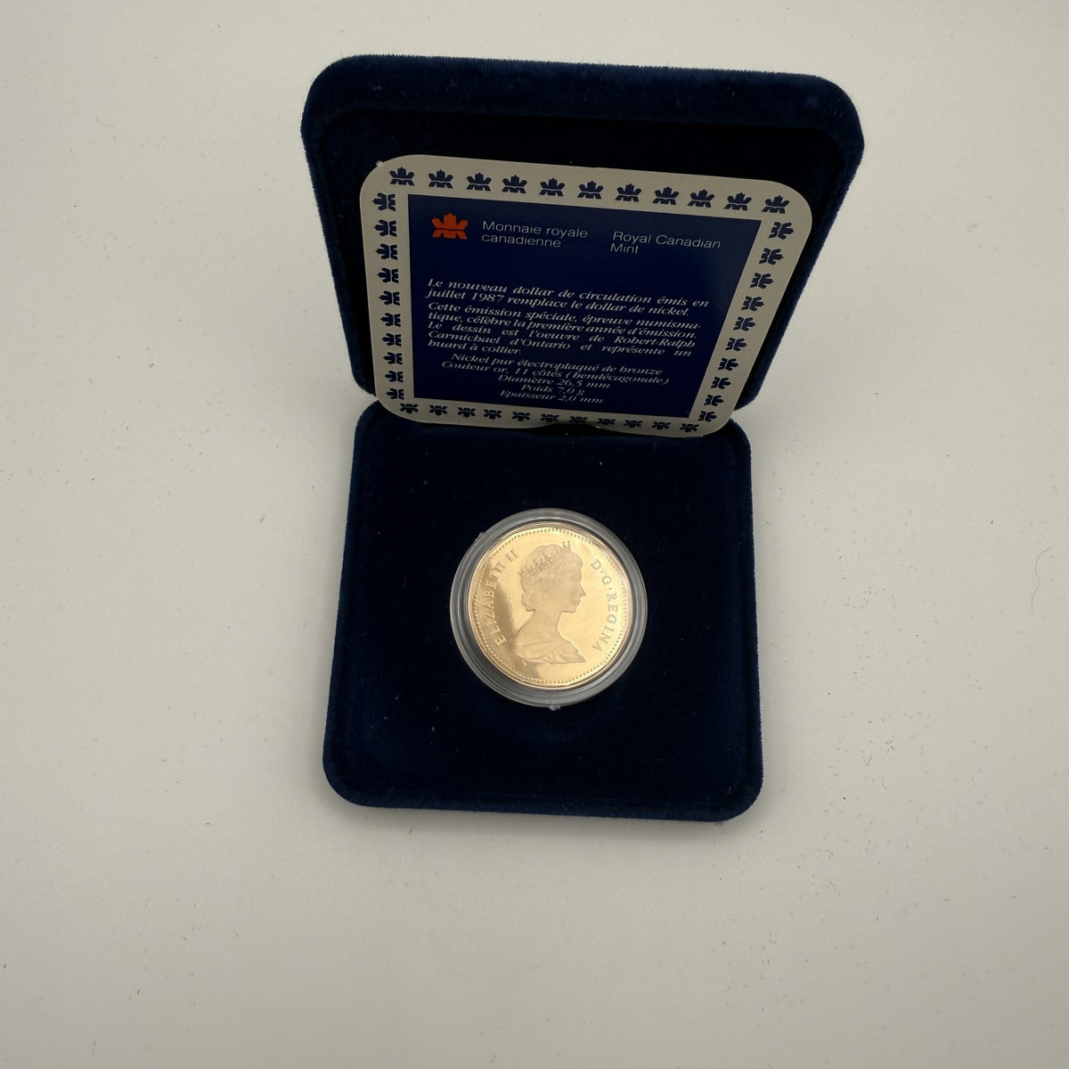 1987 Loon Proof Dollar - packaging