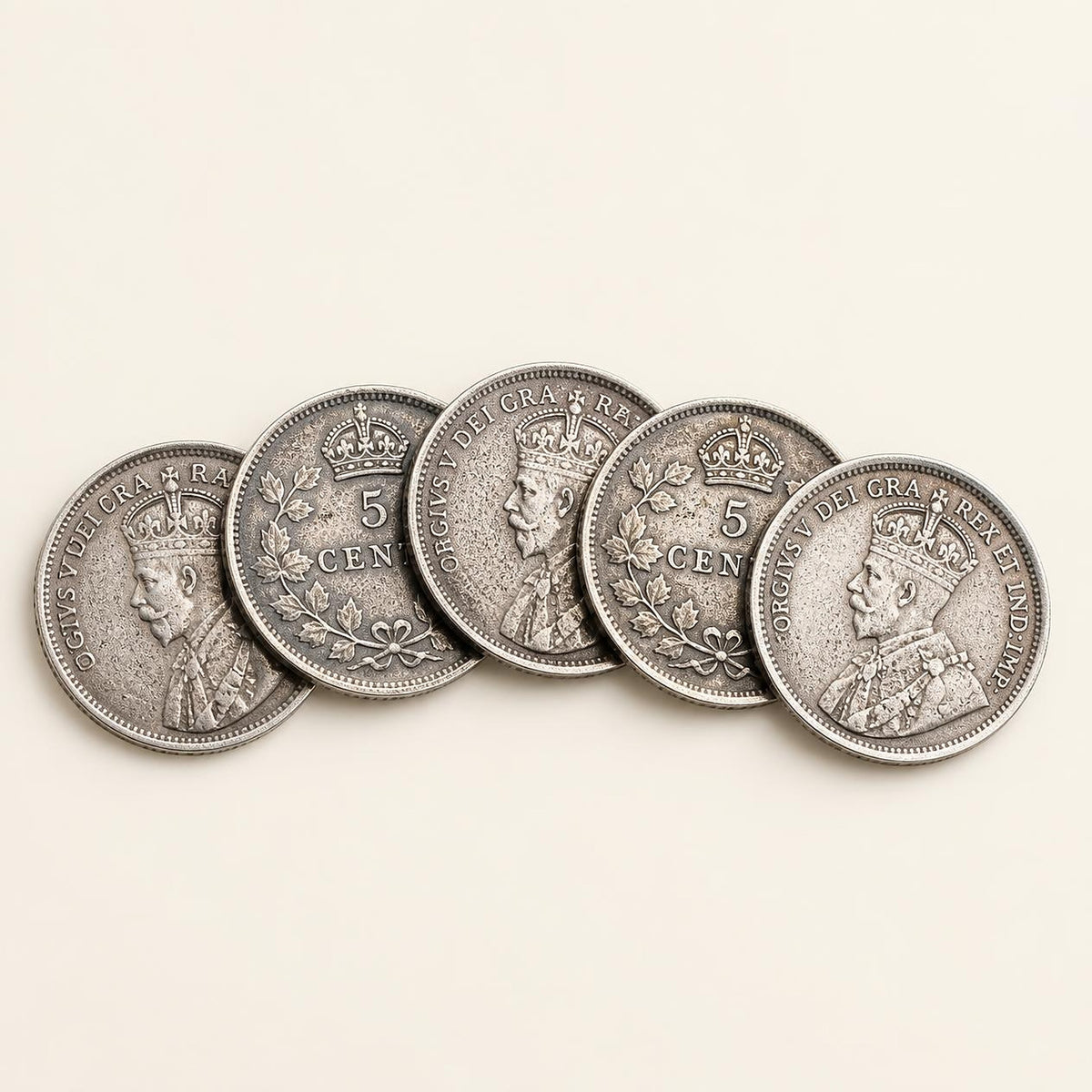 Canadian 80 percent silver five-cent fish scale coins, 1920, 5 coins (representative)