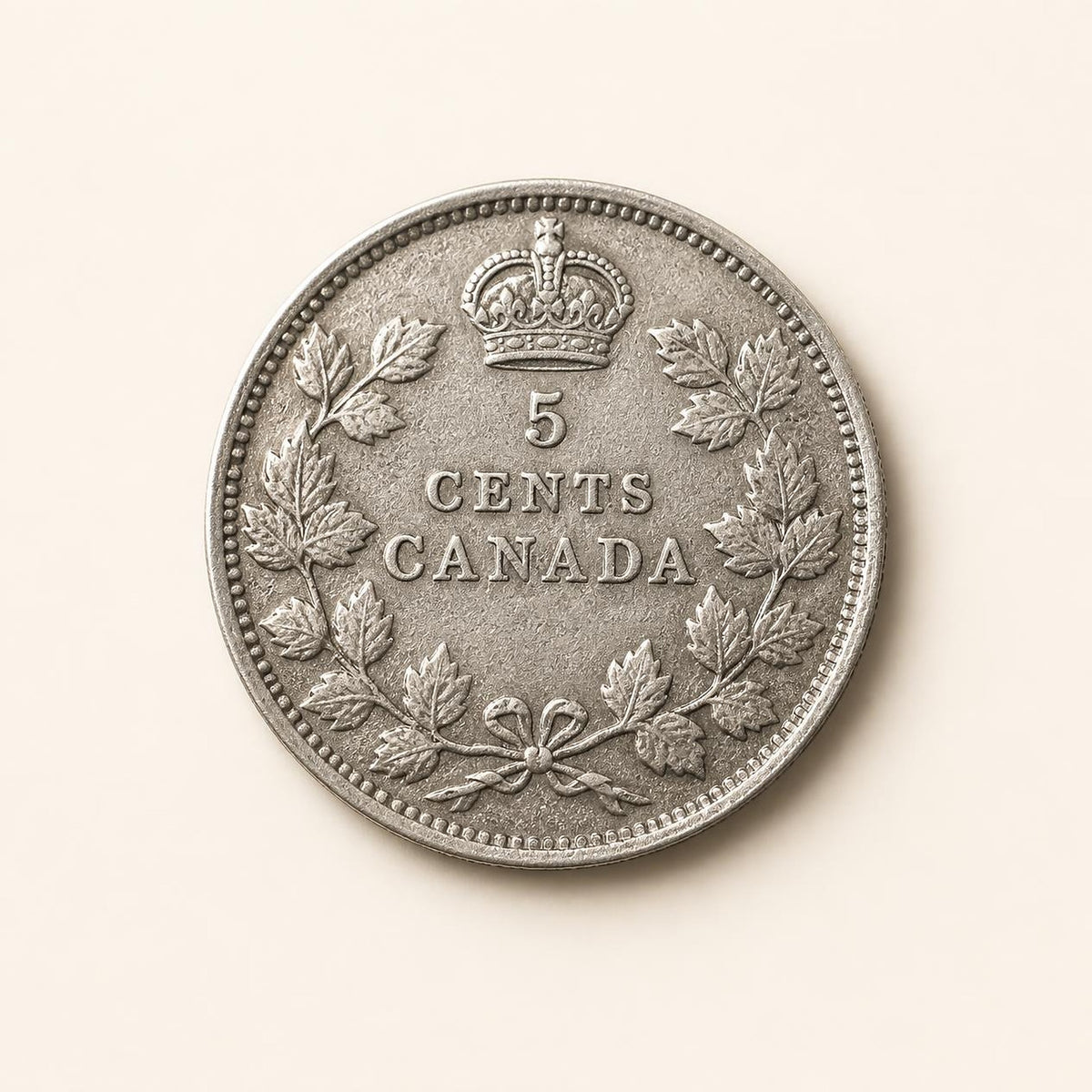 Canadian 80 percent silver five-cent fish scale coin, 1920, reverse (representative)