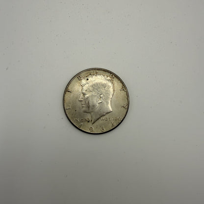 1964 Kennedy half dollar - front (representative)