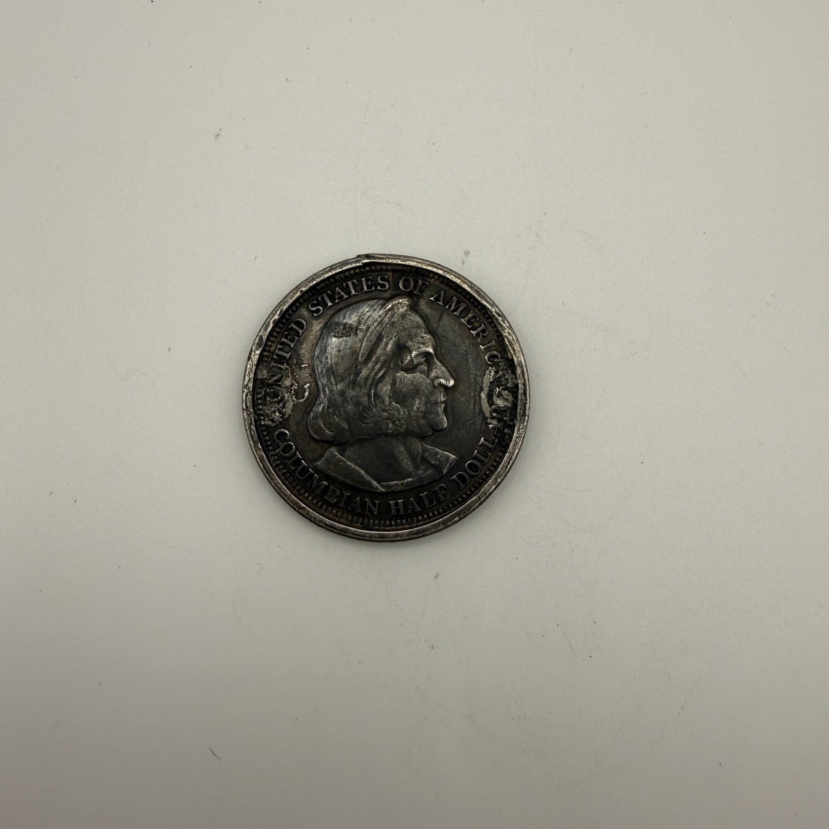 1893 Columbian Exposition half dollar, rim damage - front