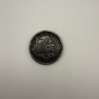 1893 Columbian Exposition half dollar, rim damage - front