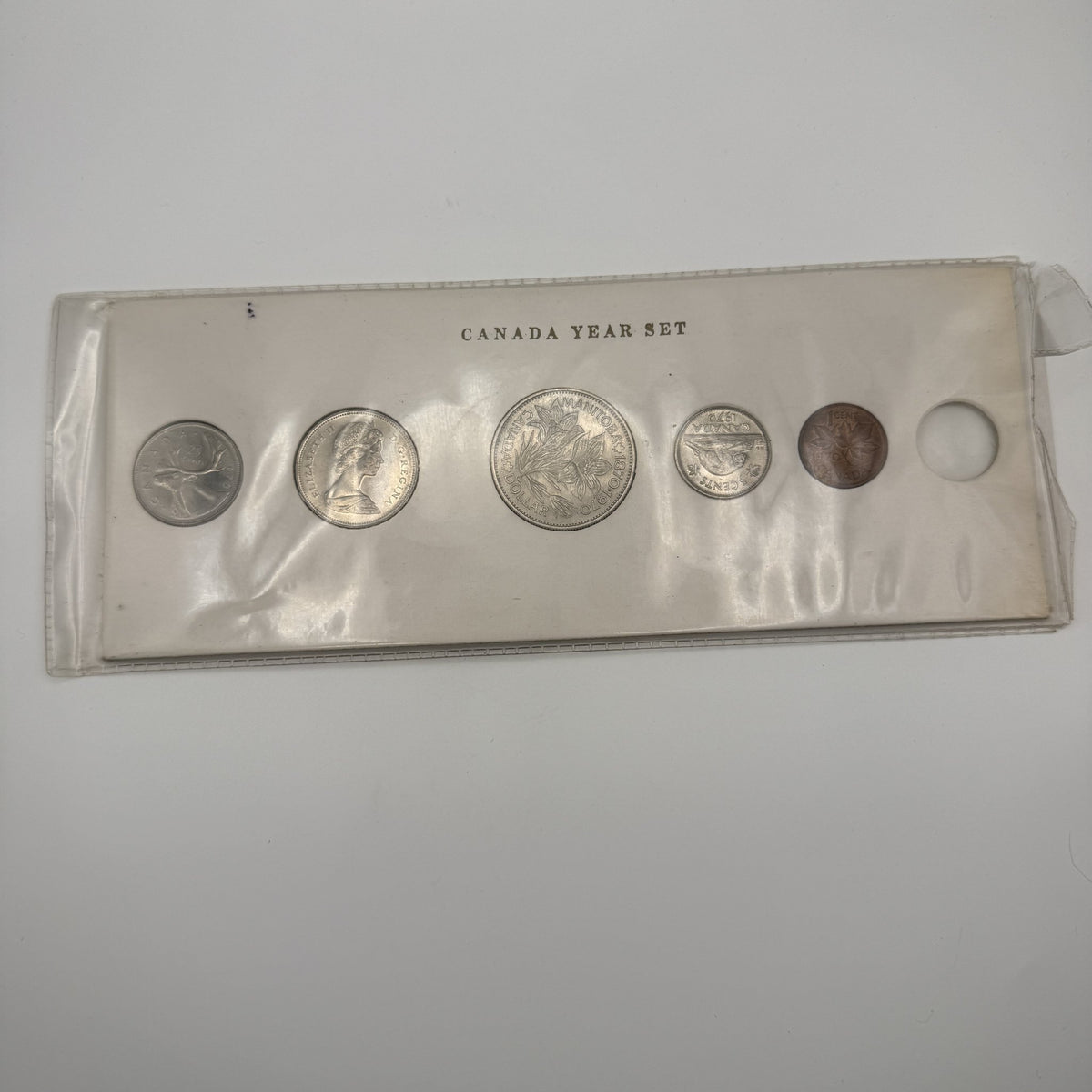 1970 Canada Year Set Holder with Manitoba Dollar - front