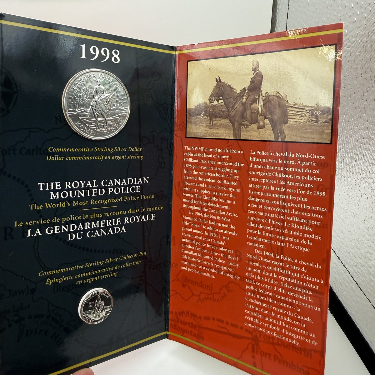 1998 Canada $1 RCMP 125th Anniversary Sterling Silver Dollar & Collector Pin Set - packaging