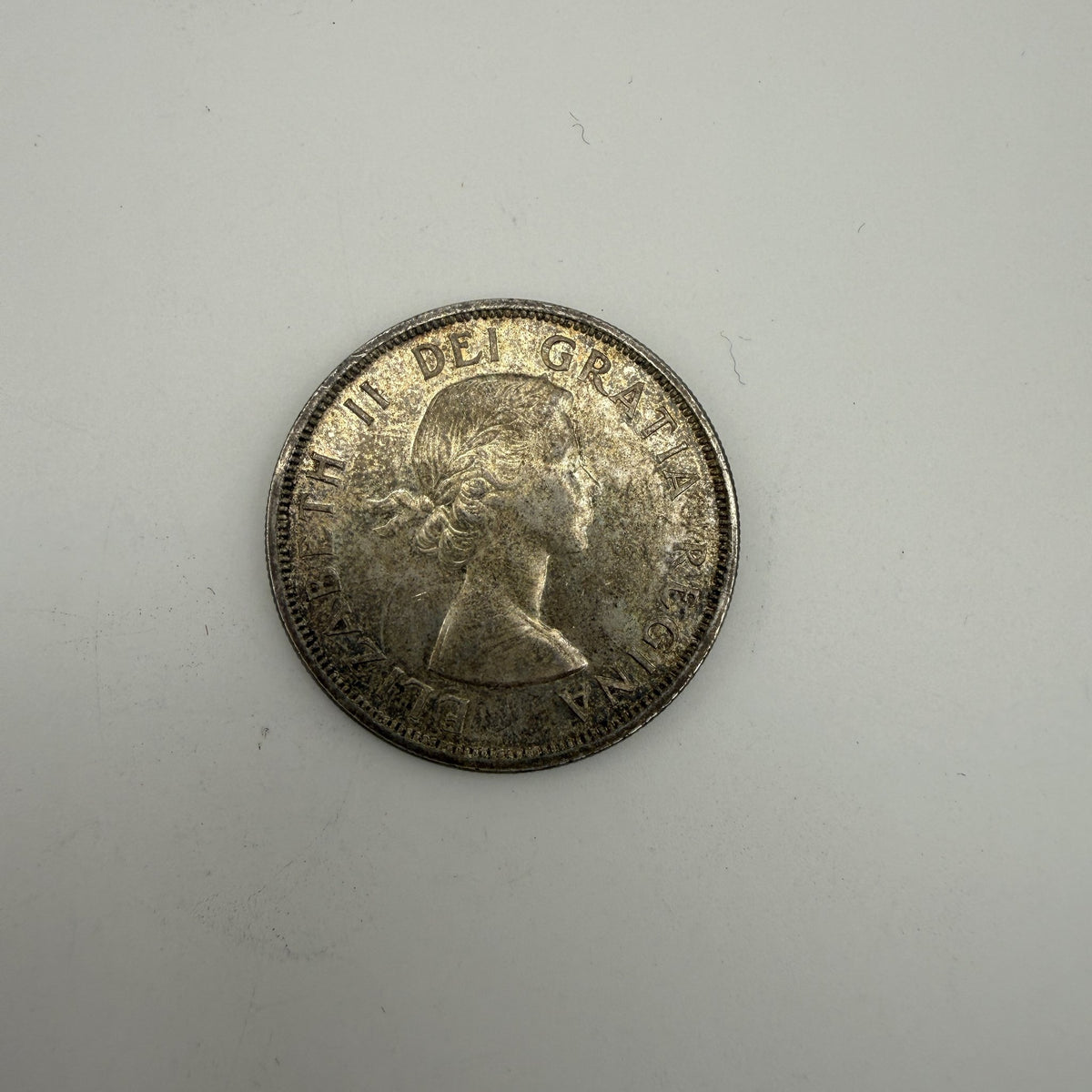 1958 Canada $1 British Columbia Centennial Totem Pole 80% Silver Dollar - back