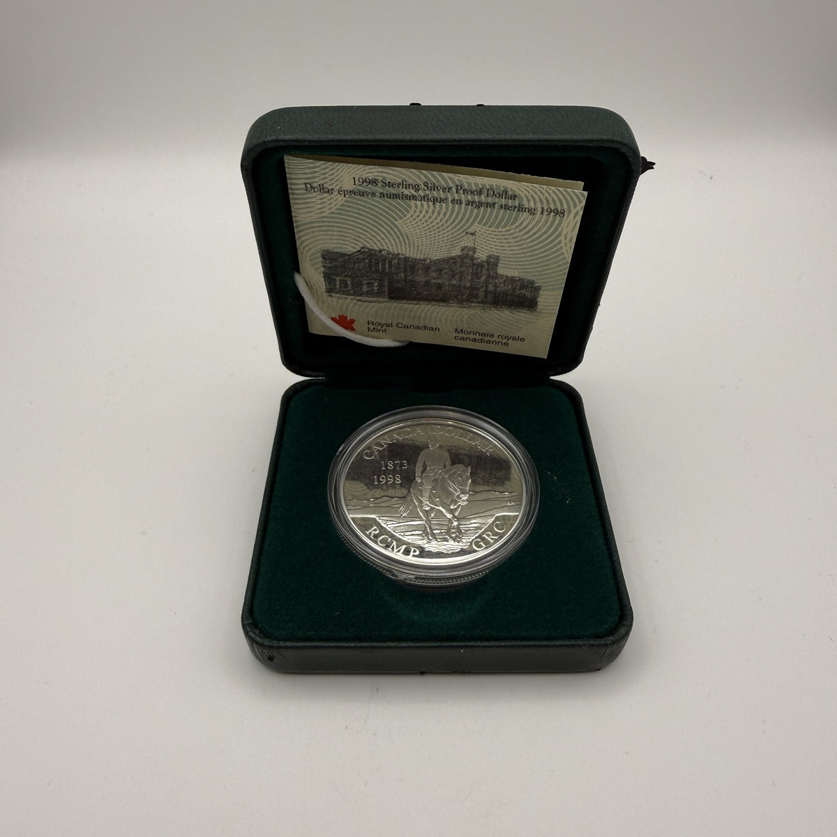 1998 Canada RCMP 125th Proof Dollar - Case & card - front